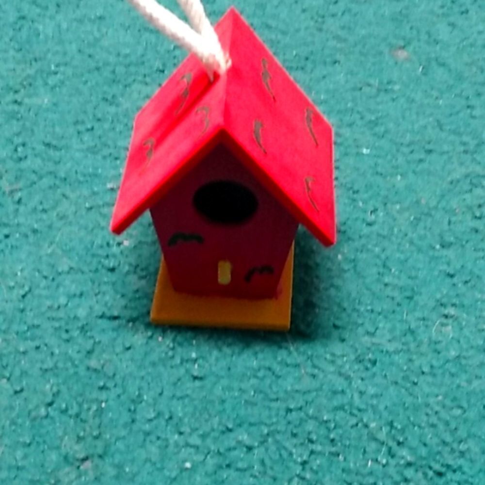 Red birdhouse ornament  